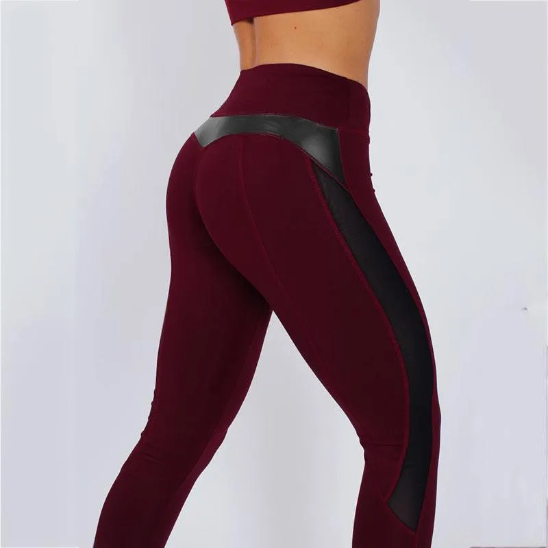 High-Waisted Femme Fitness Leggings - Solid Color with Mesh and PU Leather Patchwork Design